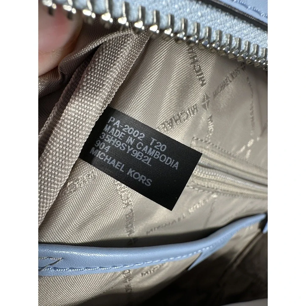 Michael Kors Kenly Medium Light Sky Leather Backpack Pebble‎